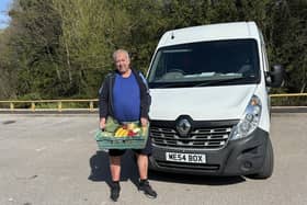 Mark Tickle with one of the mega box of fruit and veg he delivers to homes across the High Peak every week. Photo submitted