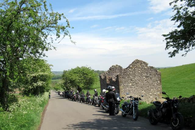 Riders taking a pitstop on Crowhill Lane near Bakewell