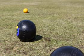 PAINSWICK, UNITED KINGDOM - APRIL 15:  Members of the Falcon Bowling Club try to hit the jack as they play bowls on the green that was first rolled in 1554 on April 15 2008 in Painswick, England. The club, which has survived over 400 years and is said to be the oldest in the UK dating back to the sport's Elizabethan heyday, is under threat of closure due to dwindling membership. Just 60 people now regularly attend bowling events and competitions at the club, down from around 90 a few years ago.  (Photo by Matt Cardy/Getty Images)