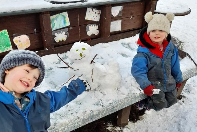 Two friends made a snowman at Bridgemont nursery in Whaley Bridge. Pic submittted