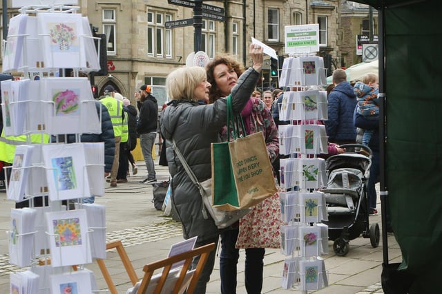 Stopping to look at the cards on sale at Buxton's Spring Fair. Pic Jason Chadwick