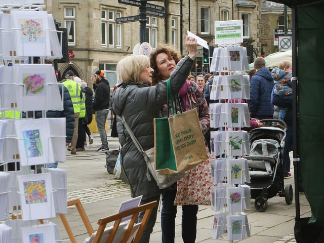 Stopping to look at the cards on sale at Buxton's Spring Fair. Pic Jason Chadwick