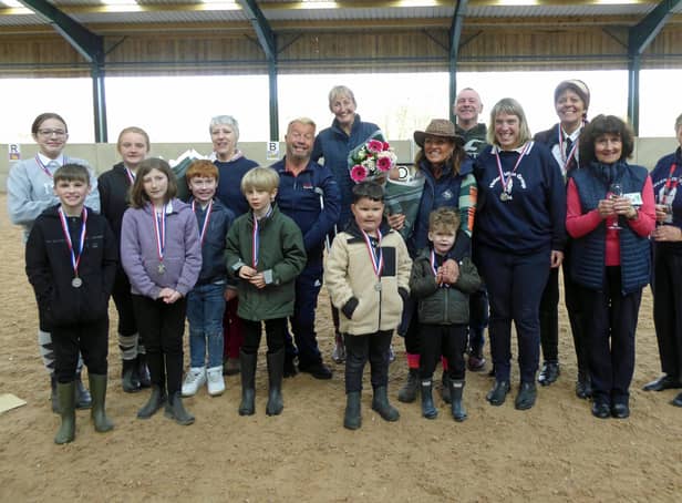 Sir Lee Pearson, back row fourth from left, with riders and representatives of Helen Atkin Group RDA including Wendy Howe, Janine Frost, Louise and Dave Thompson, rider Lindsay Green, Julie Andrew and Pat Atkin.