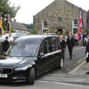 Standard bearers line the route at Town End Methodist Church, Chapel-en-le-Frith, where the funeral of war veteran Derek Eley took place