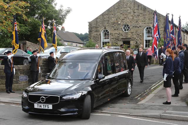Standard bearers line the route at Town End Methodist Church, Chapel-en-le-Frith, where the funeral of war veteran Derek Eley took place