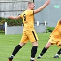 Adam Muir and Kyle Hawley appeal for a penalty against Brigg. Photo by John Fryer.