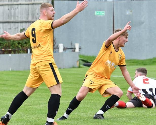 Adam Muir and Kyle Hawley appeal for a penalty against Brigg. Photo by John Fryer.
