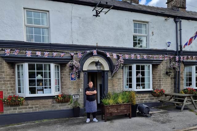 Leon Harrison from the Shady Oak in Fernilee is glad Long Hill road has reopened after five months. Pic submitted