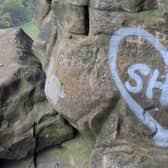 Recent graffiti left at Robin Hood's Cave on Stanage Edge. (Photo: Peak District National Park Authority)