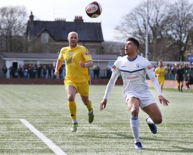 Warren Clarke waits to get the ball under control.