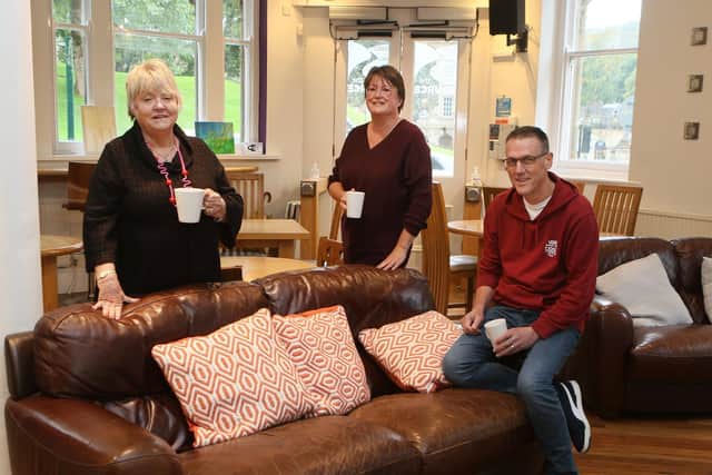 Cllr Fiona Sloman with volunteer Mary Webb and church leader Jon Parsons in The Source where a welcome space where people can got o get warm has opened up.