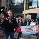 People from the transgender community hold a protest against the Supreme Court ruling on the definition of a woman outside Queen Elizabeth House. The protest was called in response to the Supreme Court ruling that the legal definition of a woman should be based on biological sex. (Photo by Jeff J Mitchell/Getty Images)