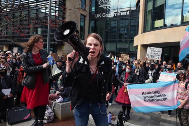 People from the transgender community hold a protest against the Supreme Court ruling on the definition of a woman outside Queen Elizabeth House. The protest was called in response to the Supreme Court ruling that the legal definition of a woman should be based on biological sex. (Photo by Jeff J Mitchell/Getty Images)