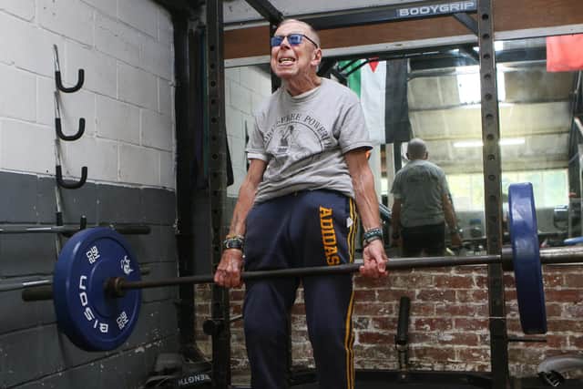 85-year-old veteran weightlifter Brian Winslow in training at Peak Power Gym