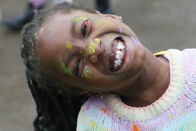 A pupil with a big smile at the St Anne's colour run. Photo Jason Chadwick