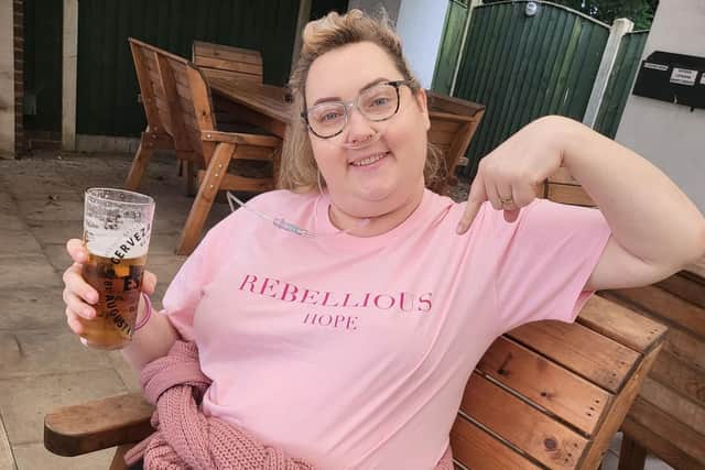 Gemma enjoying a well deserved pint.