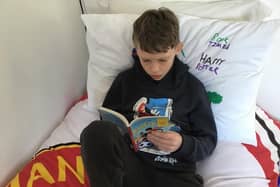 Jack in Y6 at St Anne's CVA Buxton showing off his new reading cushion. Pic submitted