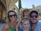 Emma and Martin Coulthurst and their children on holiday in Cyprus.