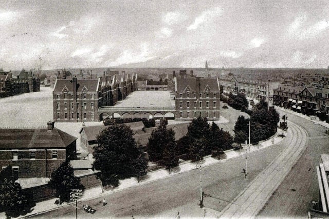 Victoria Barracks around 1920 taken from the roof of the former Pier Hotel which stood on the corner of Bellevue Terrace and Southsea Terrace.
The junction of Victoria Avenue and Bellevue Terrace (lower) with Jubilee Terrace disappearing around the bend. On the skyline can be seen the clock tower of the Guildhall, centre. To the lower left a figure, possibly a shepherd, is either herding a flock of sheep or maybe pigs south along Victoria Avenue! Amazingly, the road has been built so wide as if the designers knew the one day the car, and not one to be seen here, was coming.
The barrack blocks have all since been demolished, apart from a north block that was retained and is now the city museum.The remainder is now Pembroke Park, and all private housing. The tramlines have also long gone of course.The last trams ran in the city in November 1936