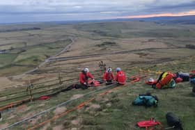 Edale Mountain Rescue Team set up the technical rope rescue system to raise the casualty back to the summit.