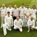 Buxton's second team celebrate a memorable promotion.