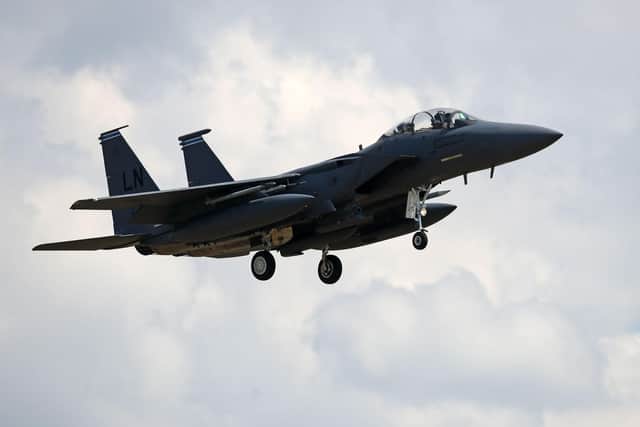 A US Air Force (USAF) F-15E Eagle fighter jet, is pictured as it prepares to land at RAF (Royal Air Force) Lakenheath on June 15, 2020. The UK Coastguard launched a search and rescue operation Monday to find the pilot of a US fighter jet that crashed during a training mission in the North Sea. The US Air Force said the F-15C Eagle went down after taking off from the RAF Lakenheath base near the town of Mildenhall in eastern England. The base is home to the 48th Fighter Wing, which has operated from there since 1960 and has more than 4,500 active-duty military members. (Photo by CHRIS RADBURN / AFP)