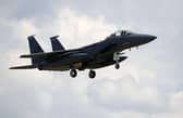 A US Air Force (USAF) F-15E Eagle fighter jet, is pictured as it prepares to land at RAF (Royal Air Force) Lakenheath on June 15, 2020. The UK Coastguard launched a search and rescue operation Monday to find the pilot of a US fighter jet that crashed during a training mission in the North Sea. The US Air Force said the F-15C Eagle went down after taking off from the RAF Lakenheath base near the town of Mildenhall in eastern England. The base is home to the 48th Fighter Wing, which has operated from there since 1960 and has more than 4,500 active-duty military members. (Photo by CHRIS RADBURN / AFP)