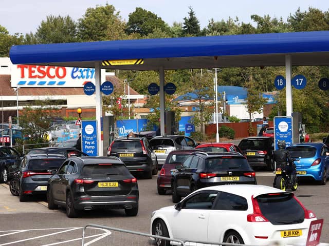 Motorists have rushed to fill up their tanks in recent days despite being told not to panic buy (Photo by ADRIAN DENNIS/AFP via Getty Images)