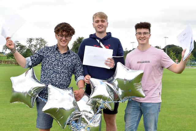 From left, Buxton boys Ben O’Donnell, Xavier Moore and Toby Denton celebrate their A-level results. (Photo: Michael Carter/King's School)