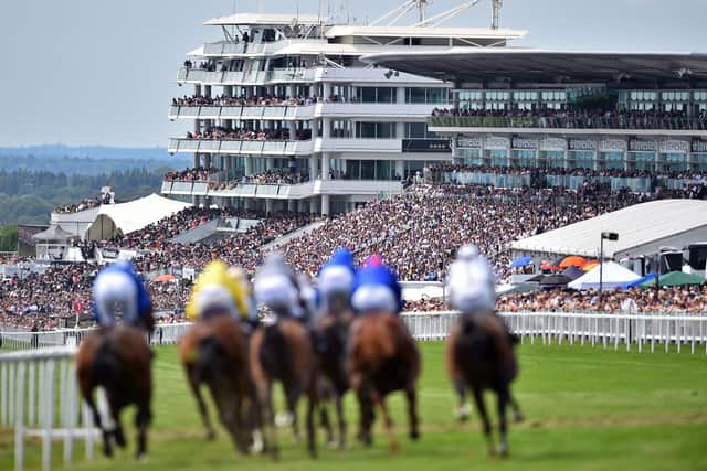 The spectacular scene at Epsom Downs racecourse for Derby Day. (PHOTO BY: Glyn Kirk/Getty Images)