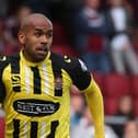Ashley Chambers in action for Cambridge United.