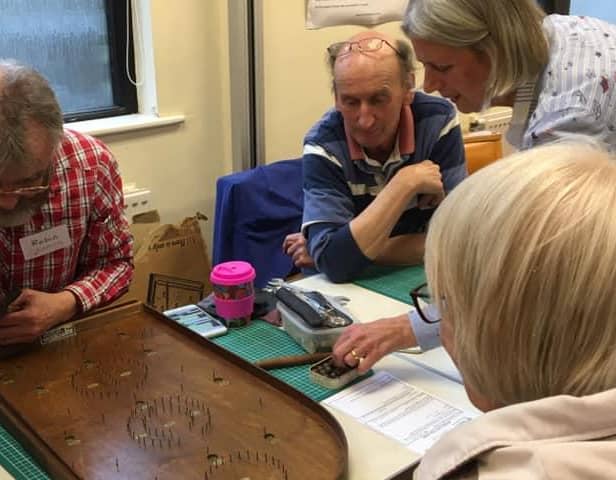 Volunteers at the Repair Café are able to fix all manner of household items from clothes to toys, and tools to electricals.