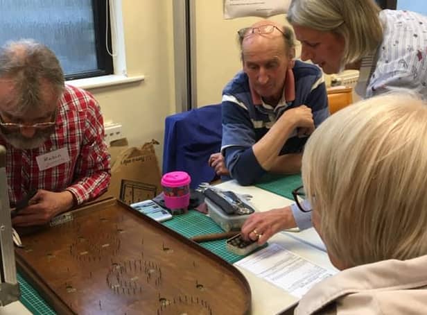 Volunteers at the Repair Café are able to fix all manner of household items from clothes to toys, and tools to electricals.