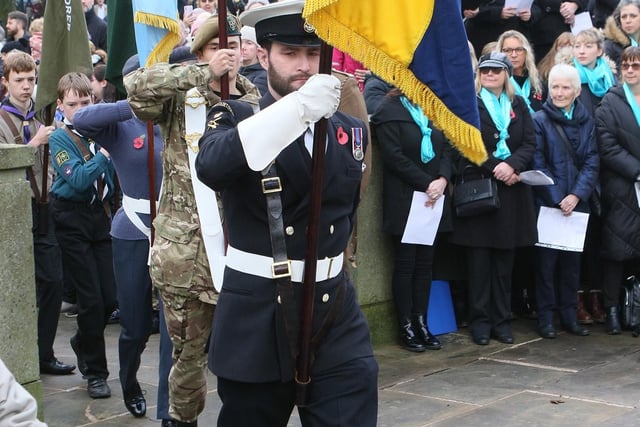 The standard bearers march on at the Buxton Remembrance Service