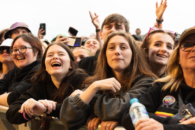 Front-row fans watch the bands on the main stage on Friday.