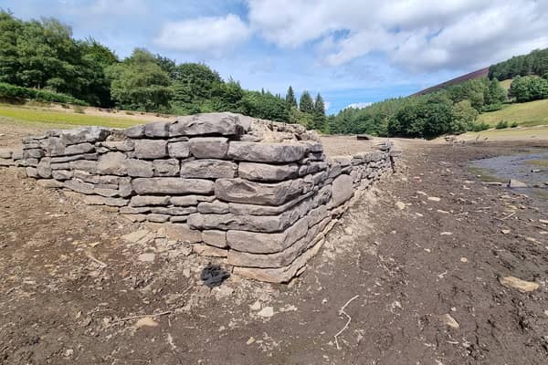 Another of the buildings which has emerged after water levels at Ladybower Reservoir fell dramatically