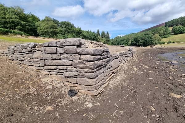 Another of the buildings which has emerged after water levels at Ladybower Reservoir fell dramatically