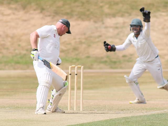 A big shout for a wicket from Buxton against Ashover.