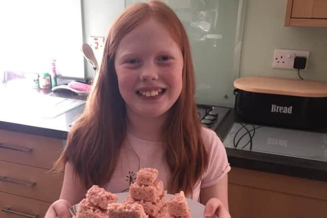Maisie Bowers with her shortbread Egyptian pyramids