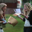 Students receive their results (Photo by Christopher Furlong/Getty Images)