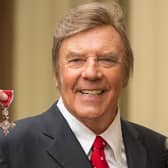Marty Wilde with his MBE for services to music. Photo by Dominic Lipinski/Getty Images.