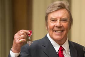 Marty Wilde with his MBE for services to music. Photo by Dominic Lipinski/Getty Images.