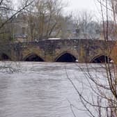 Derbyshire rivers on flood warning. River Wye Bakewell.
