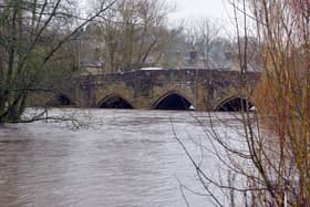 Derbyshire rivers on flood warning. River Wye Bakewell.