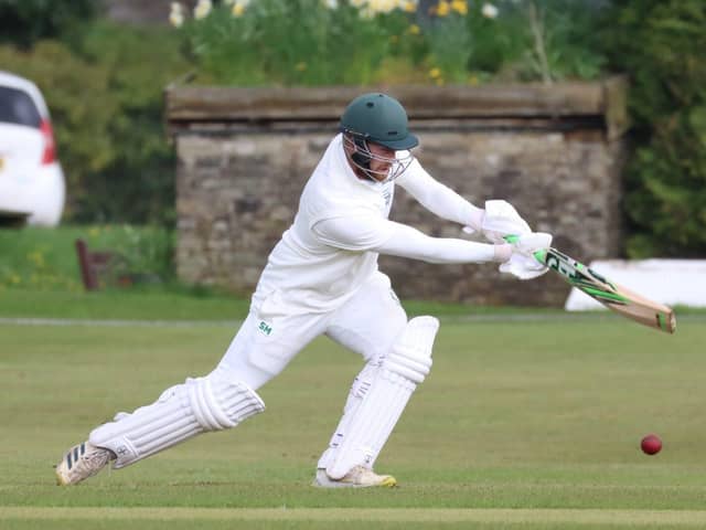 Matt Whitehouse scoring 50 runs for Buxton