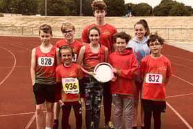 Members of High Peak Athletics club celebrate success.