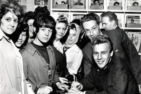 PYE recording artist Mark Wynter signs autographs at a music shop in Heanor, 1962.