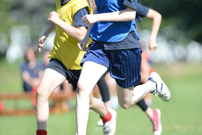 Year seven girls compete in the 200m.