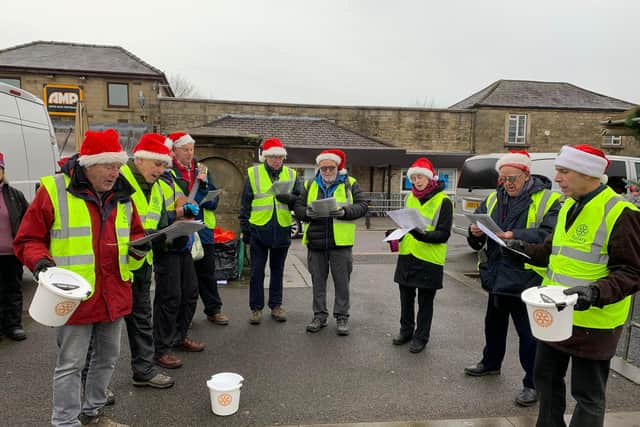 Buxton Rotary have had a busy few months helping with community events and raising money. Pictured singing carols in December