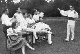 November 1939:  Czechoslovakian refugees from the Nazi invasion of their country rehearsing in the gardens of Farley Hall near Matlock. The refugees ran their own theatre in the hall.  (Photo by Fox Photos/Getty Images).